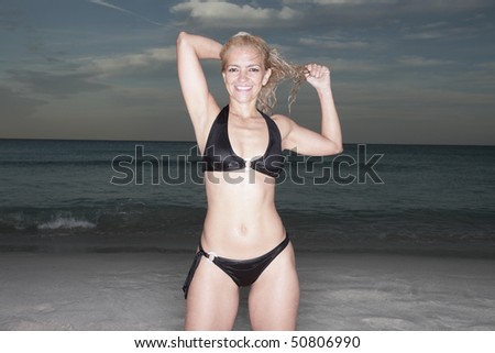stock photo Sexy mature woman in a bikini shot with ring flash