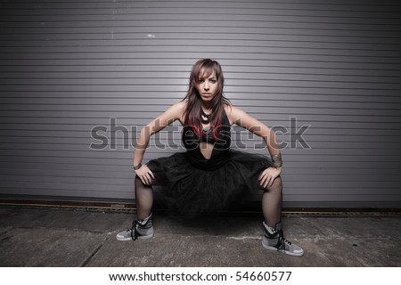 Attractive woman wearing punk rock fashion