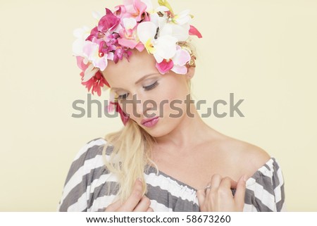 Model with flowers wrapped around her head