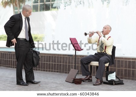 Businessman and a clarinet player