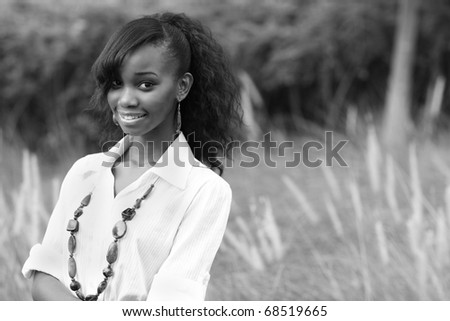 Black and white image of a beautiful young black woman