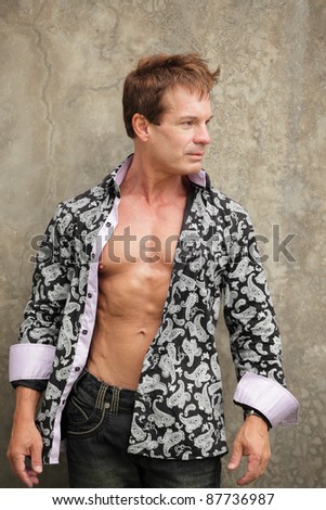Fashionable man with shirt unbuttoned