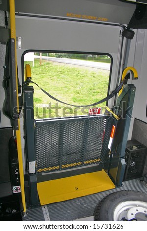 Closed wheelchair lift on a bus