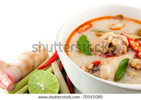 chicken wing tom yum in bowl (Thai food) and herb ingredient on white background