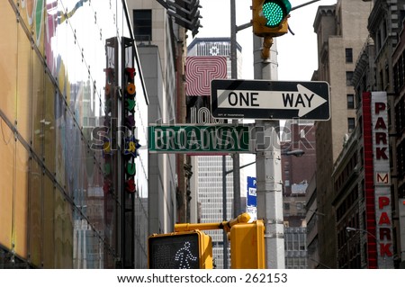 Broadway and One Way signs in Times Square, Toys R Us in background