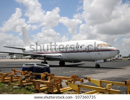 Old airplane undergoing maintenance and refurbushment