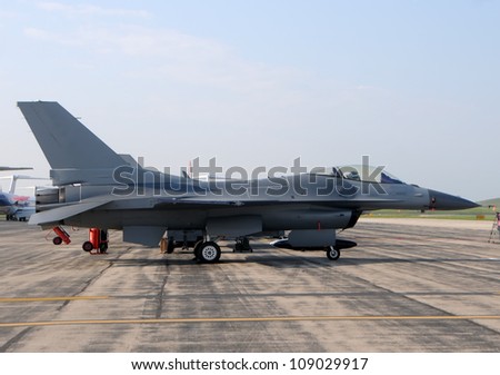 Modern fighter jet airplane on the ground  side view