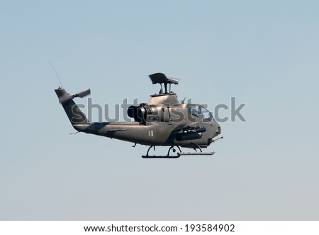 Vietnam War era military attack helicopter in flight