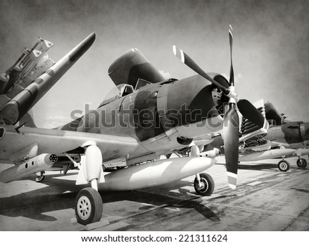 World War II era fighter planes in stained old photo