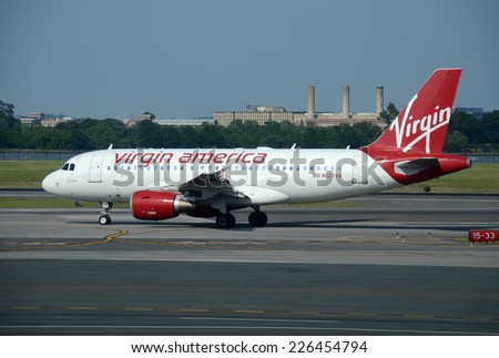 WASHINGTON - MAY 30: Virgin America passenger jet departs from Washington DC to its home base in San Francisco, California on May 30, 2013