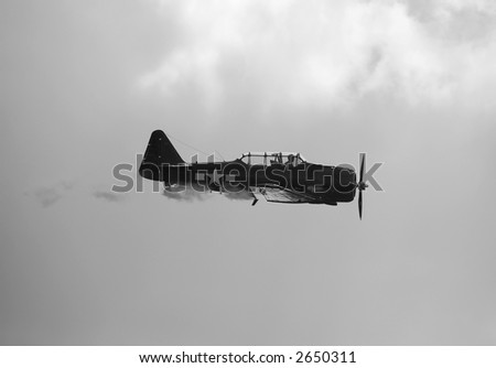 Black and white side view of world war airplane