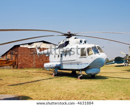 Cold War era Russian made helicopter parked in remote airfield