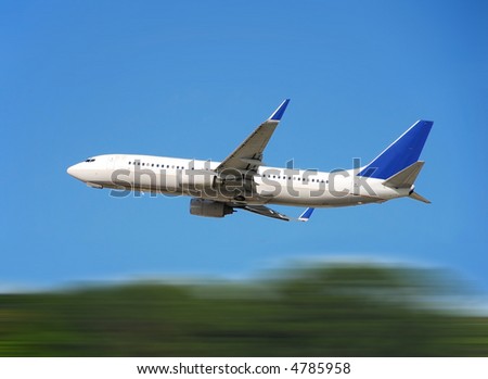 Passenger jet departing with motion blur
