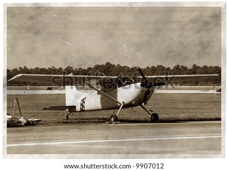 Vintage propeller airplane (artificially aged photo)