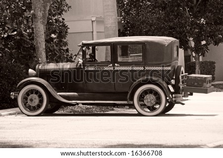 Black and white photo of vintage taxi cab
