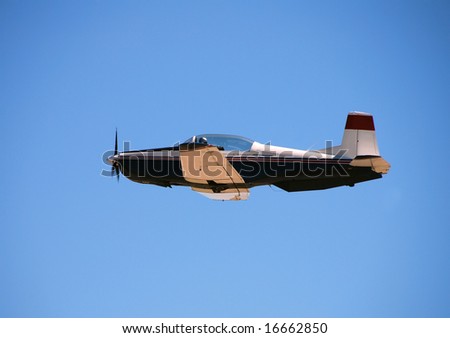 Light private propeller driven airplane in flight