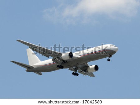 Big cargo carrying airplane in flight