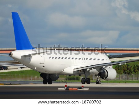Rear view image of departing passenger jet