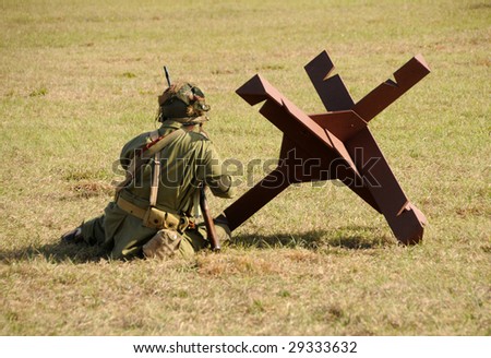 Soldier taking position on the ground