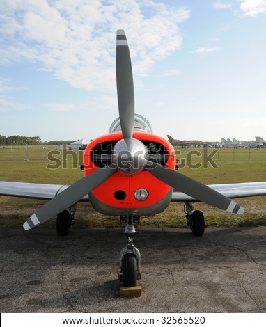 stock-photo-old-propeller-airplane-front-view-32565520.jpg