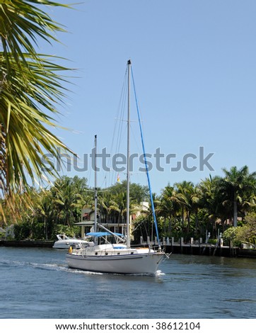 Sailboat moving in the waterways of Fort Lauderdale, Florida