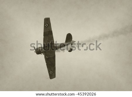 World War II era military airplane in a dive