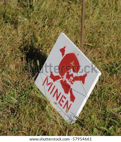 Old german warning sign for land mines