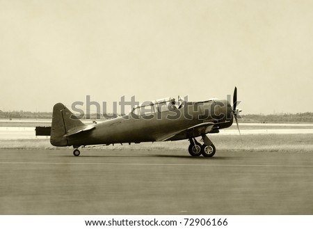 World War II era propeller airplane on the ground
