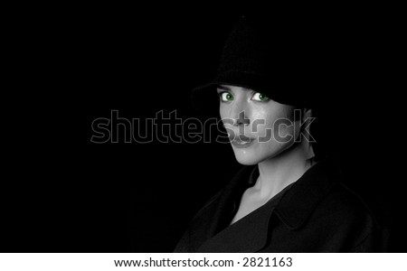 Black and white glamor portrait female model with green eyes