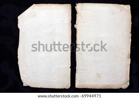 two blank sheets from a ancient book from almost 300 years old isolated on black