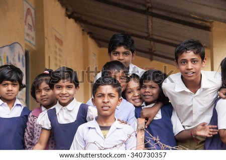 ALANGAON, MAHARASHTRA, INDIA - February 22, 2014: Happy Indian rural boy and girl at their school, Alangaon, Amravati , Maharashtra, India