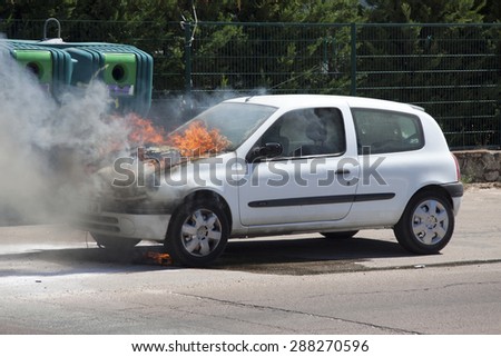 CORSE, FRANCE - CIRCA SEPTEMBER 2010: Burning car after a motor explosion