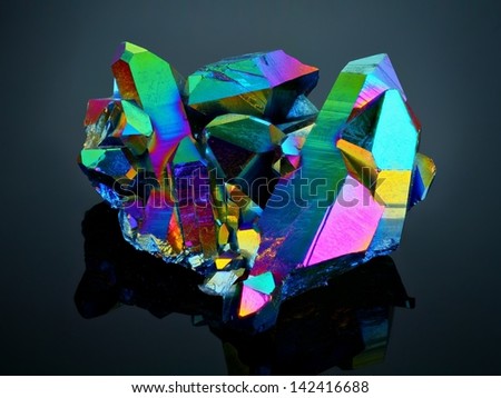 Extreme sharp Titanium rainbow aura quartz crystal cluster stone taken with macro lens stacked from many shots into one very sharp image.
