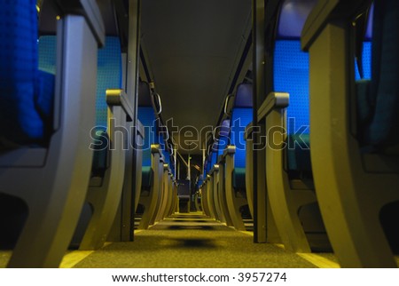 blue compartment seats in the train