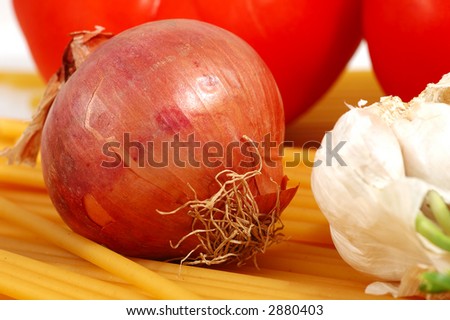 extreme close up of onion before cook spaghetti recipe