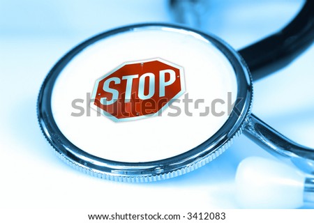 stethoscope in blue lights with a stop sign on it...health concept