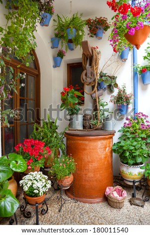 Courtyard with Flowers decorated and Old Well - Cordoba Patio Fest, Spain, Europe