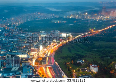 Panorama of Night road with motion traffic in residential district, city life, Istanbul, Turkey
