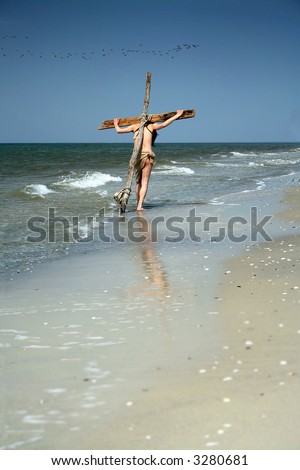 male plays the part of Christ on the cross... It is a perfect image for your design