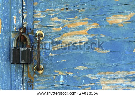 antique door close with padlock / background