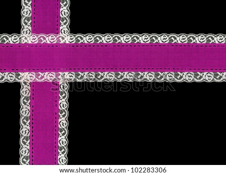 Vintage pink purple ribbon with lace border isolated on black background