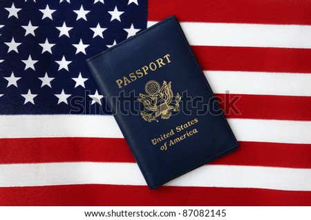 New Blue United States of America Passport isolated on US Flag background