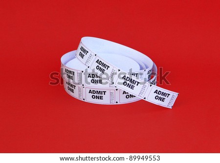 New Admit One Tickets isolated on red background