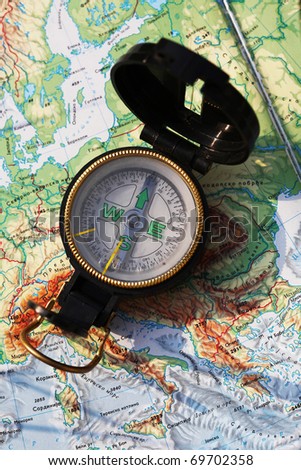 Army compass placed on the map of Europe