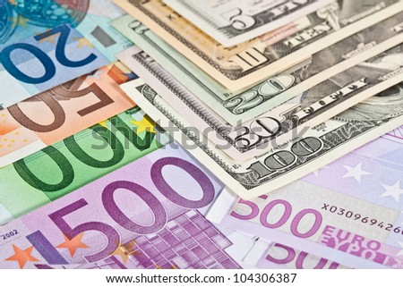 Euro versus dollar: euro and dollar banknotes