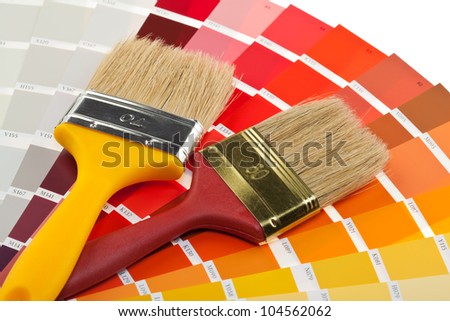 Paintbrushes and color samples for interior and exterior decoration works