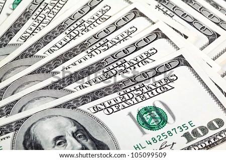 Fan of dollar paper money; many dollar banknotes