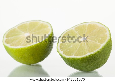 Fresh cut lime on white background