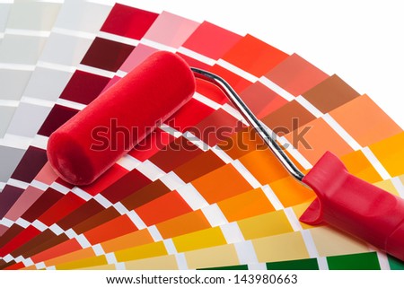Paint roller and color samples for interior and exterior decoration works