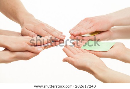 Several people hiding cards, one person showing a green card, white background